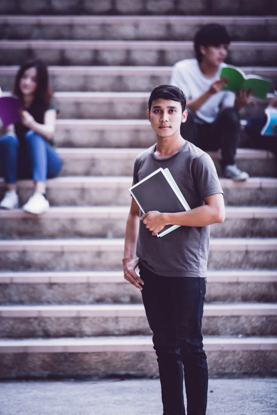 group of happy teen high school students outdoors